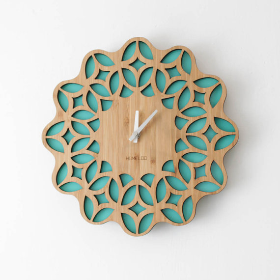 Round wooden wall clock with a repeating lattice ring